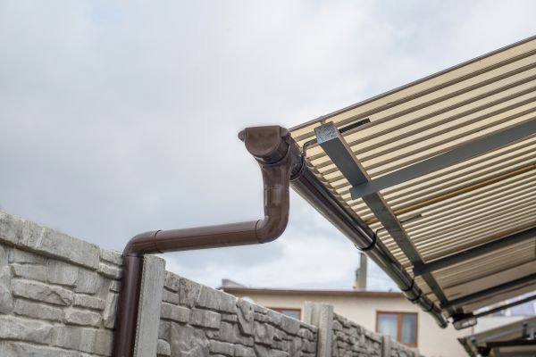 Plastic Downspout Installation in Akron